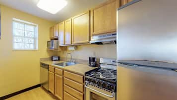 Two Bedroom Suite | Private kitchen | Full-size fridge, microwave, oven, stovetop