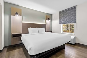 Premium bedding, desk, laptop workspace, free WiFi