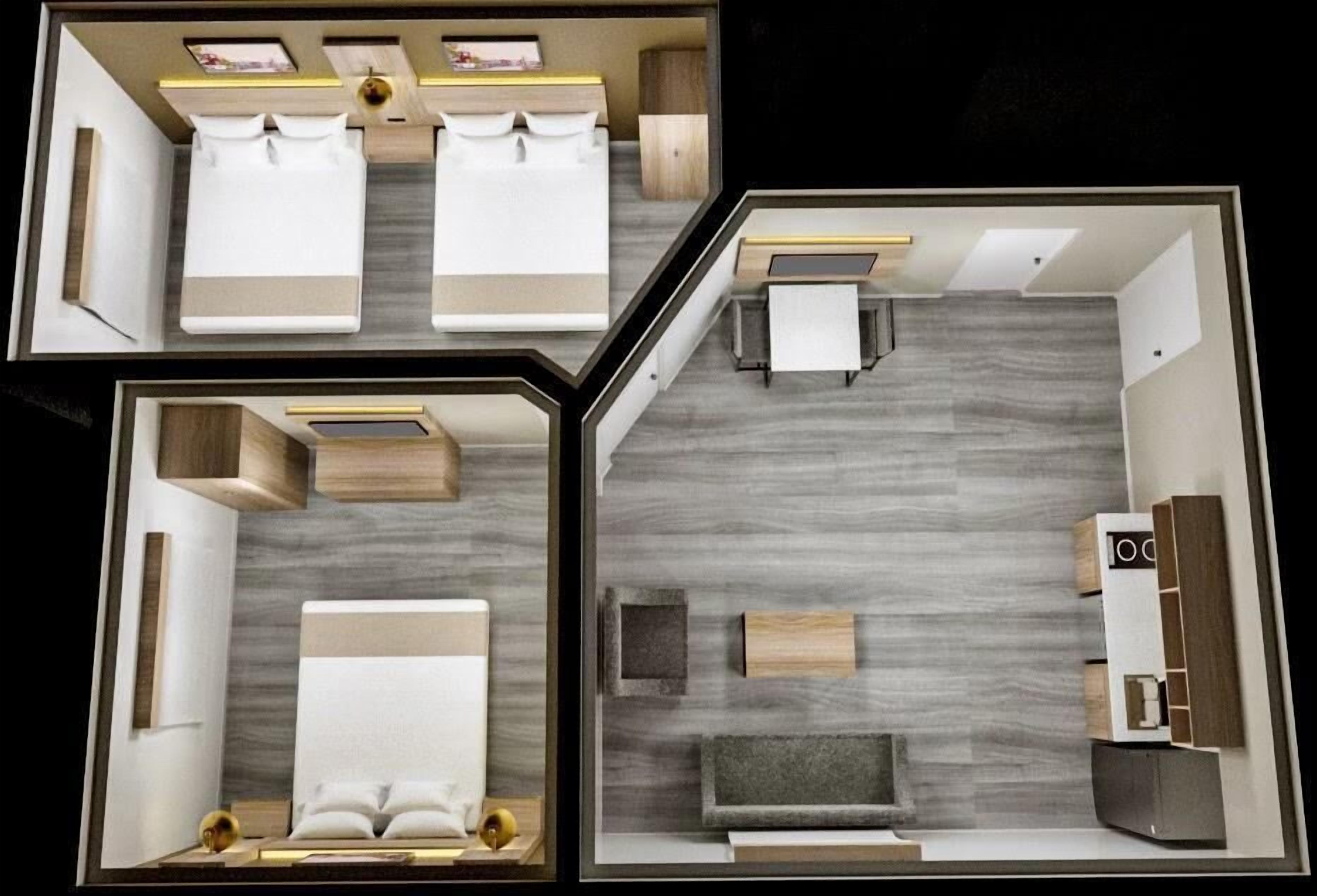 A hotel room layout with two beds, a sitting area, a kitchenette, and a bathroom.