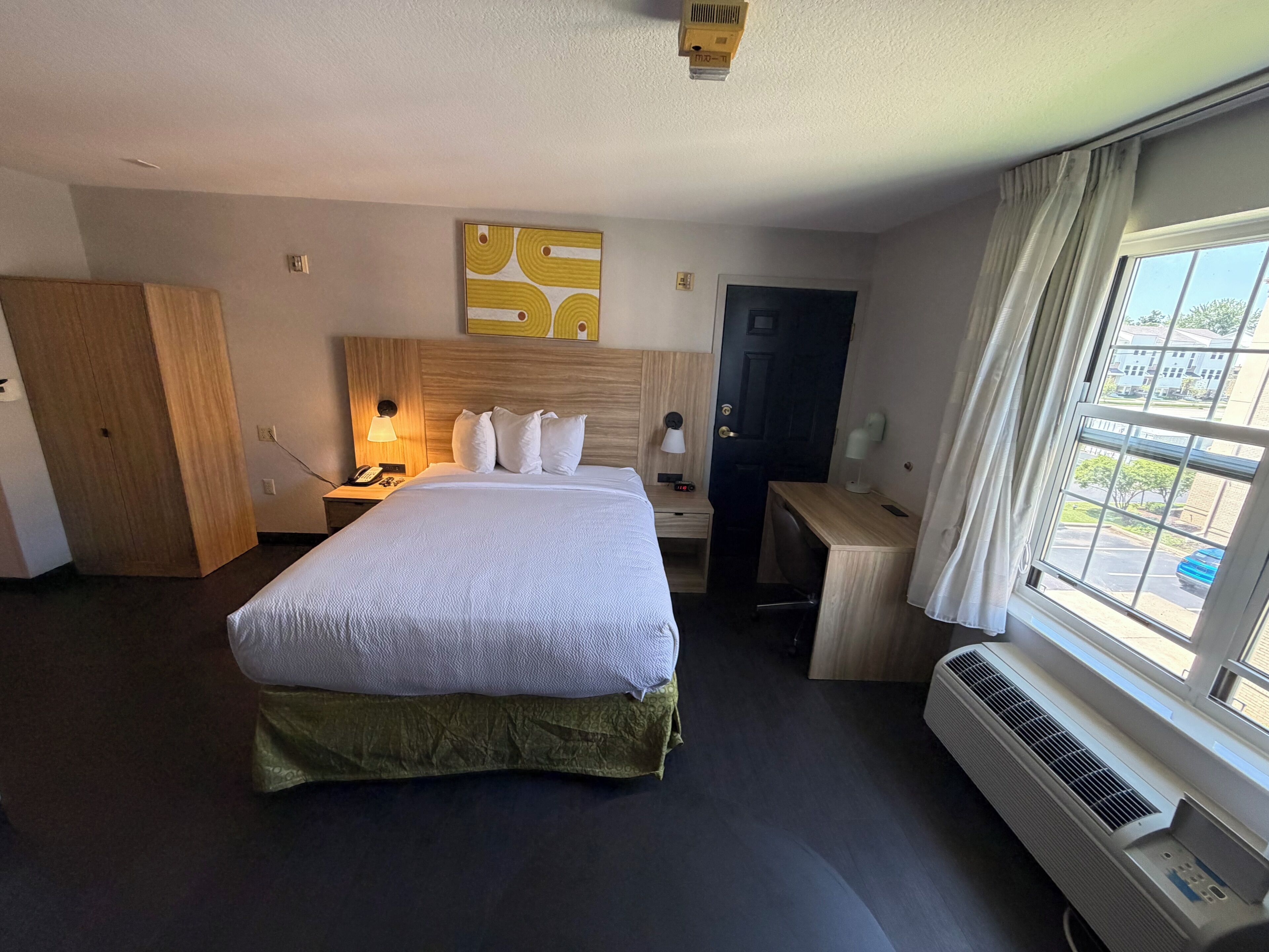 Desk, laptop workspace, blackout curtains, iron/ironing board