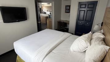 Superior Suite, 1 Queen Bed with Sofa bed (One Bedroom with Home Office) | Living area | 55-inch Smart TV with cable channels