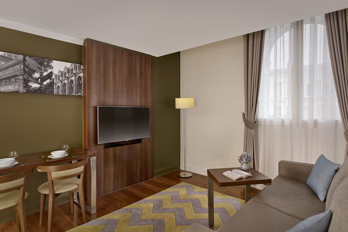 Apartment, 1 Bedroom | Living area | LCD TV