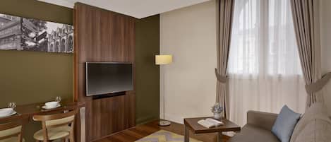 Apartment, 1 Bedroom | Living area | LCD TV