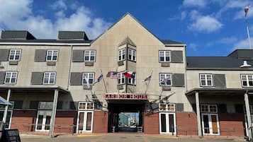 A multi-story building with a prominent entrance labeled 'Harbor House.'