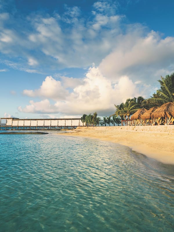 On the beach, white sand, 2 beach bars