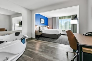 Room, 1 King Bed, Non Smoking, Hot Tub | Desk, laptop workspace, blackout drapes, iron/ironing board