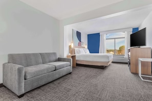 Room, 1 King Bed with Sofa bed | Living area | 55-inch flat-screen TV with cable channels, TV, streaming services