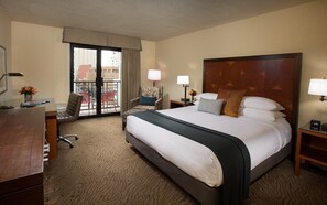 Enjoy a comfortable stay in this stylish room with a large bed, desk, and city view.