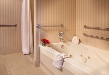 Suite, 1 King Bed, Accessible, Fireplace | Bathroom | Designer toiletries, hair dryer, towels, soap at The Paramount Hotel