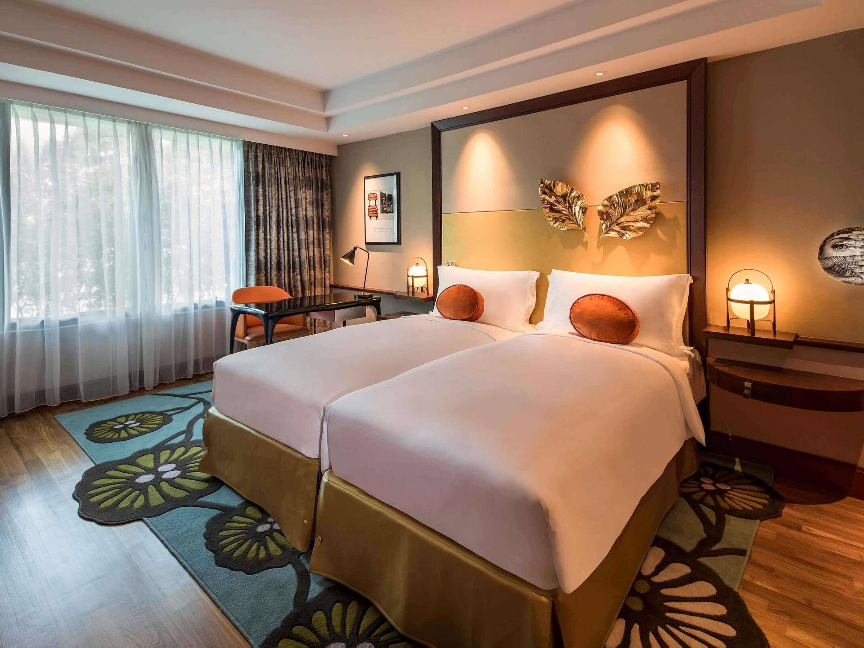Pillow-top beds, minibar, in-room safe, desk