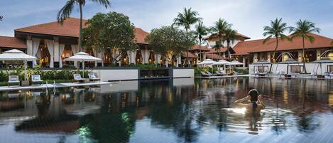 Outdoor pool, free cabanas, pool umbrellas