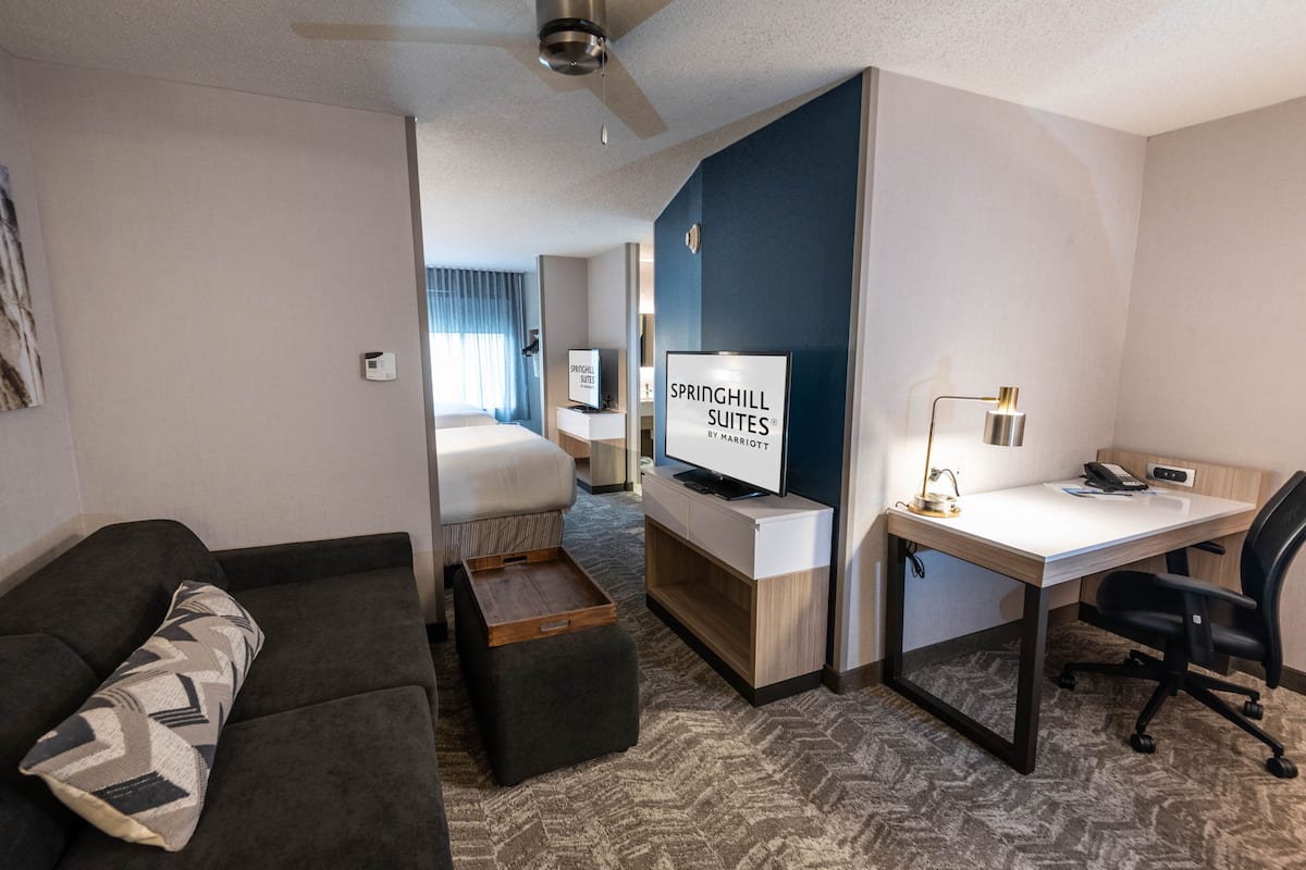 Premium bedding, Tempur-Pedic beds, desk, laptop workspace