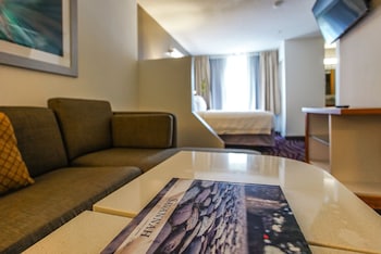 Studio Suite, 2 Double Beds | Living area | 32-inch flat-screen TV with cable channels, TV at Springhill Suites by Marriott Savannah Midtown