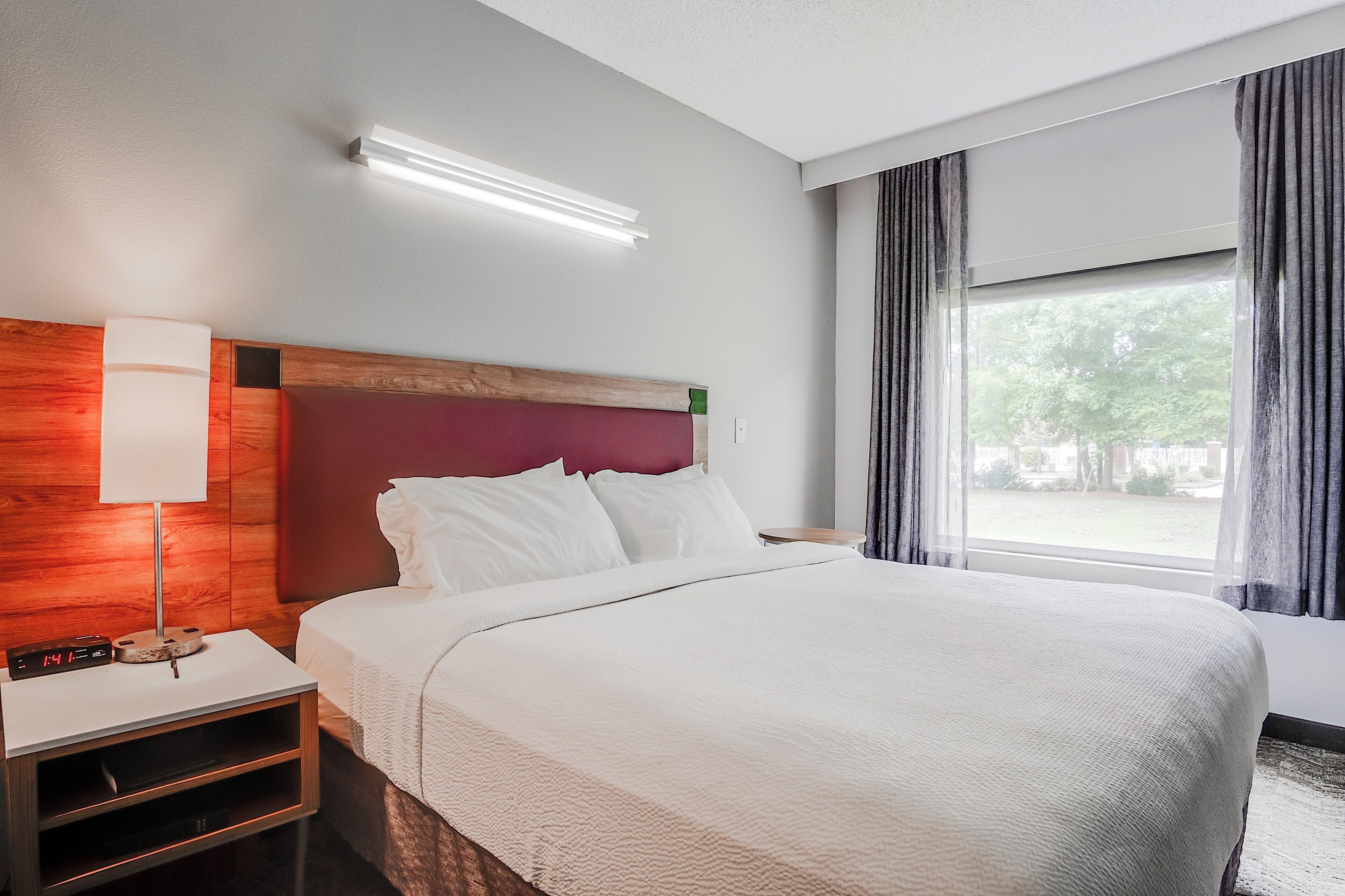 Desk, blackout drapes, iron/ironing board, free cribs/infant beds