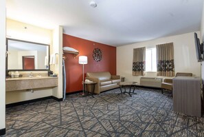 Deluxe Suite, 1 King Bed, Non Smoking | Premium bedding, desk, cribs/infant beds, rollaway beds