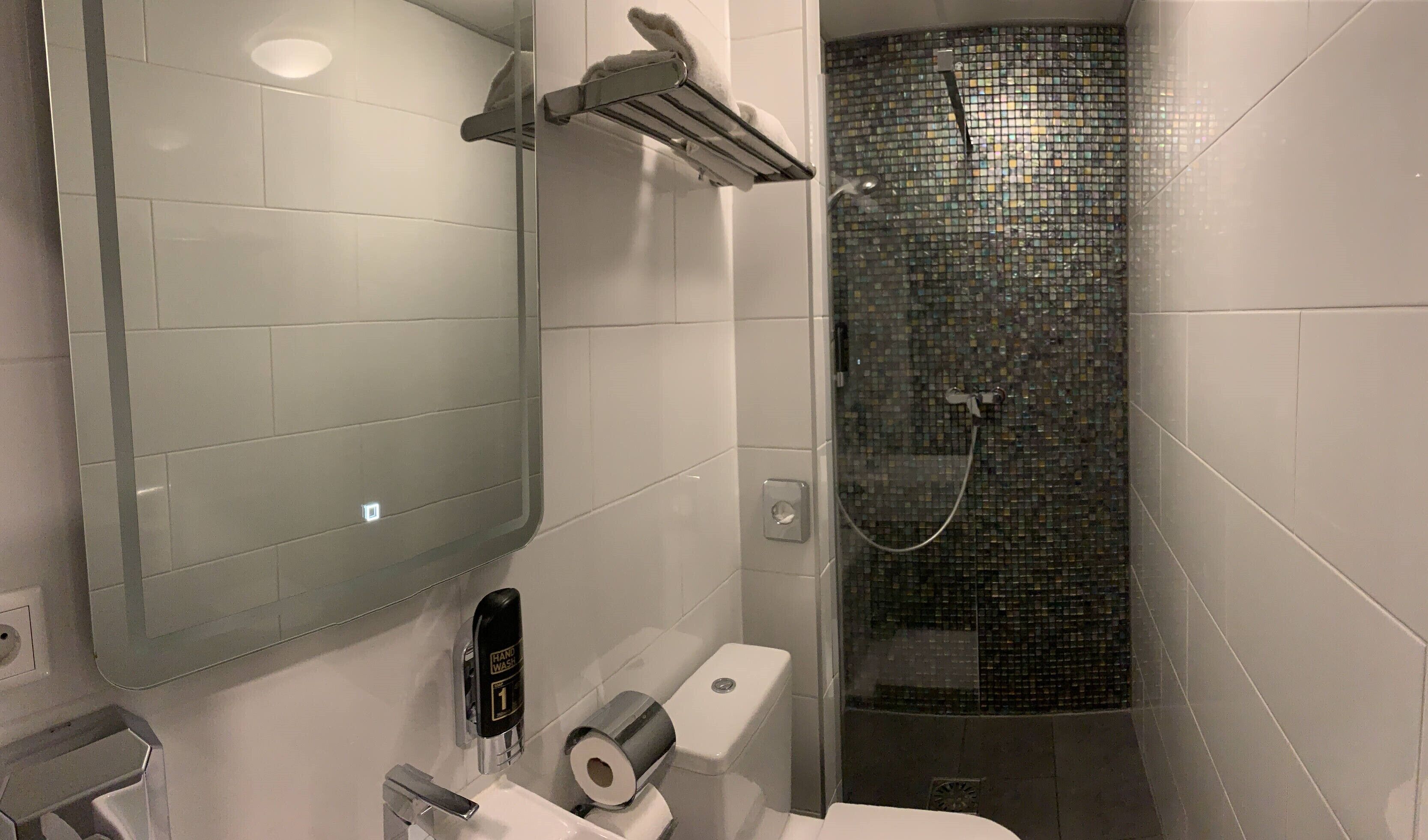 double room (small) | bathroom | shower, hair dryer, towels, soap