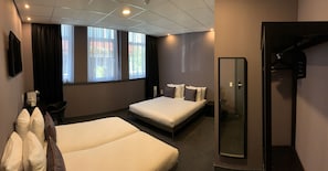 Family Room | In-room safe, desk, laptop workspace, blackout curtains