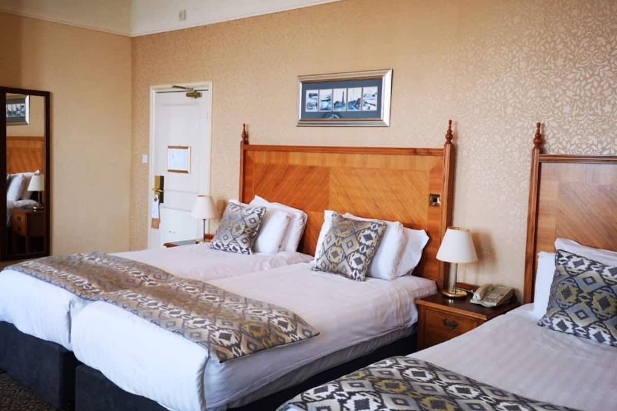 premium family room | 1 bedroom, individually decorated, individually furnished, desk