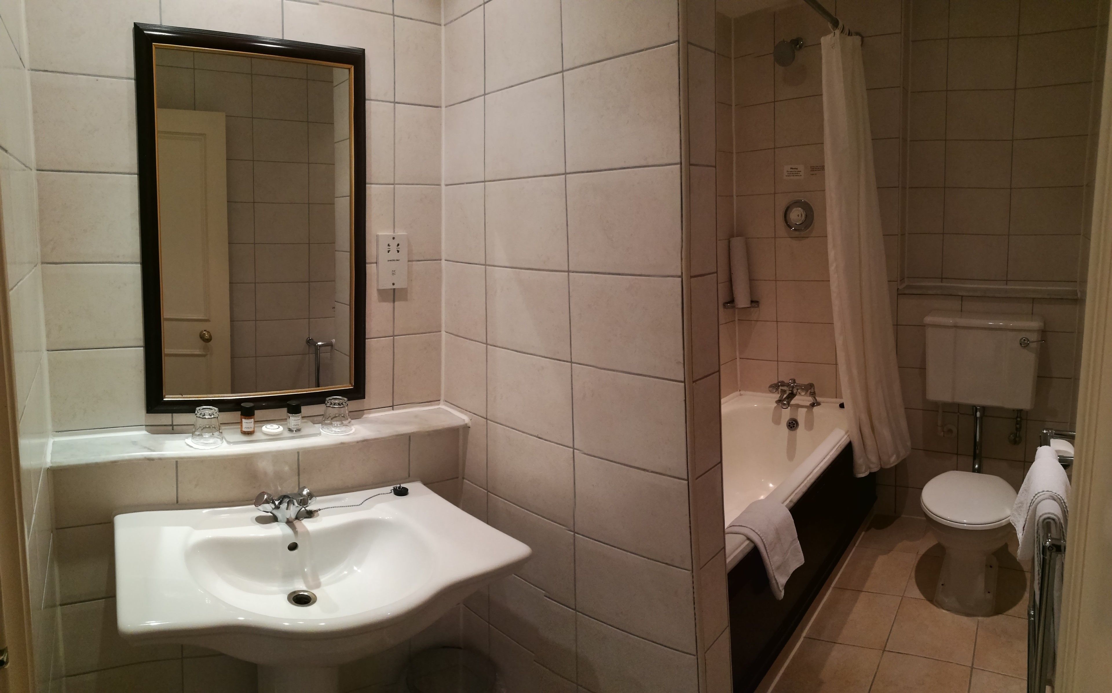 standard twin room | bathroom | designer toiletries, hair dryer, towels