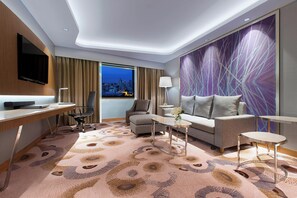 Deluxe Suite, 1 Bedroom | Living area | 43-inch LCD TV with satellite channels, TV