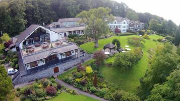 Experience a serene atmosphere amidst lush gardens and a mix of architectural styles.