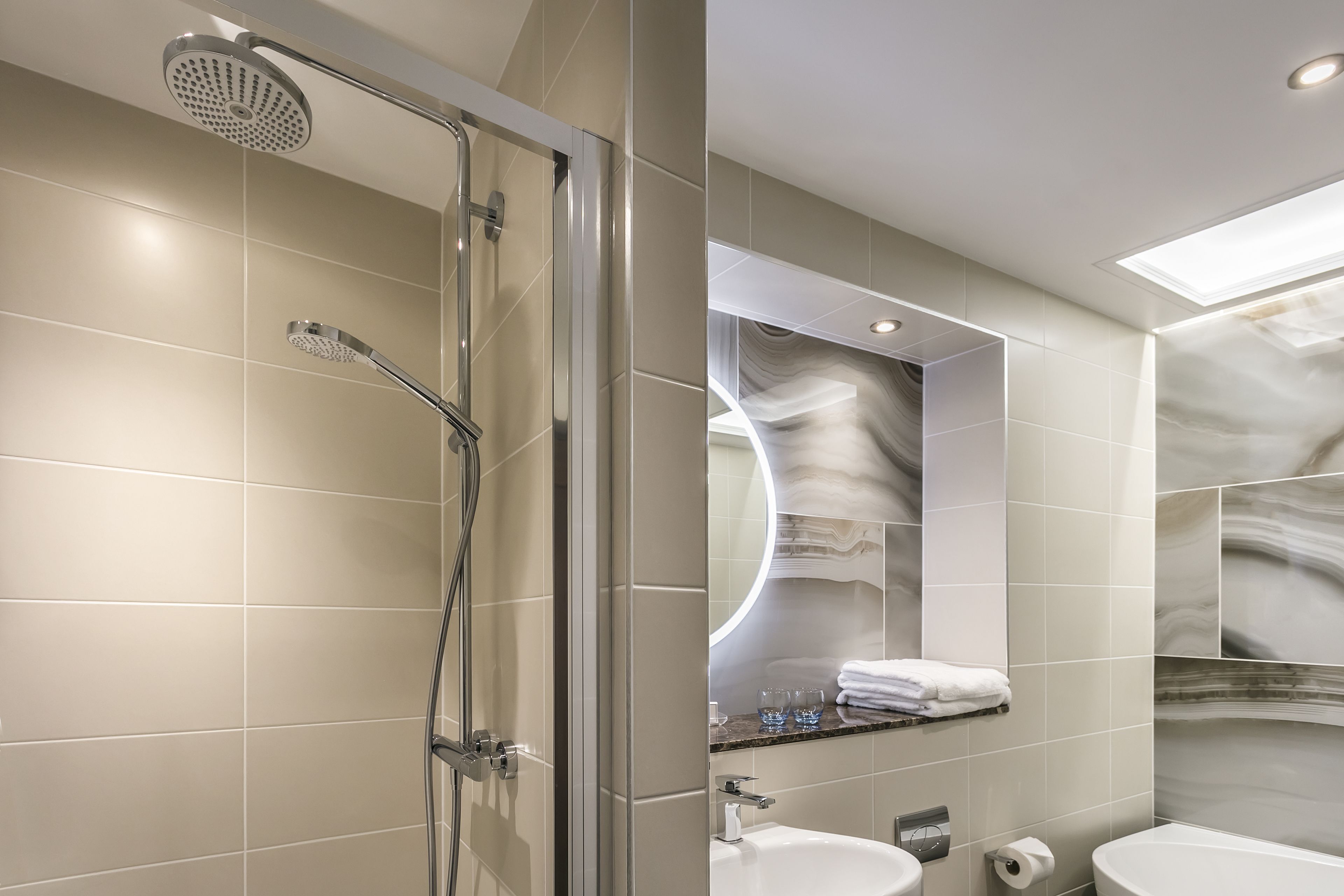 suite, 1 king bed, non smoking, refrigerator | bathroom | combined shower/bathtub, free toiletries, towels