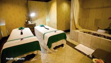 Relax in this serene retreat with two single beds, a bathtub, and a peaceful ambiance.