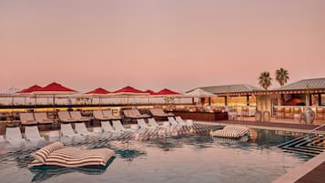 Outdoor pool, pool umbrellas, sun loungers