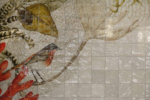 A tiled wall with a bird and abstract patterns. - InterContinental Table Bay Cape Town by IHG (Cape Town)