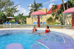 2 outdoor pools, open 6:00 AM to 8:00 PM, pool umbrellas, pool loungers