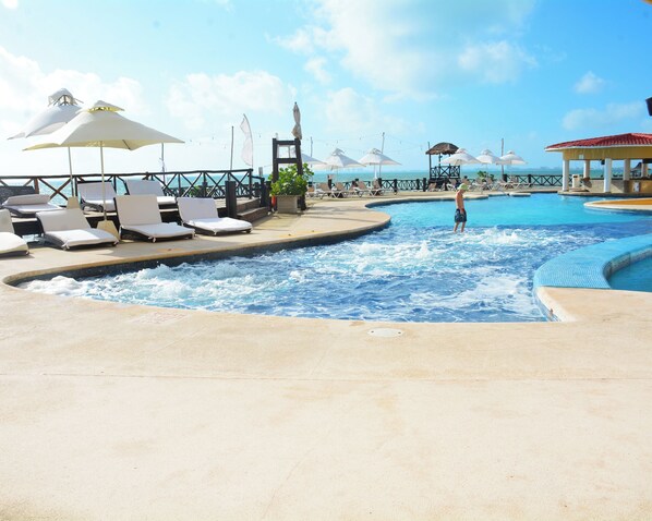 2 outdoor pools, open 6:00 AM to 8:00 PM, pool umbrellas, pool loungers