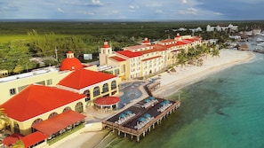 Private beach, white sand, sun loungers, beach umbrellas