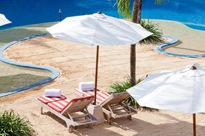 Outdoor pool, pool umbrellas, sun loungers