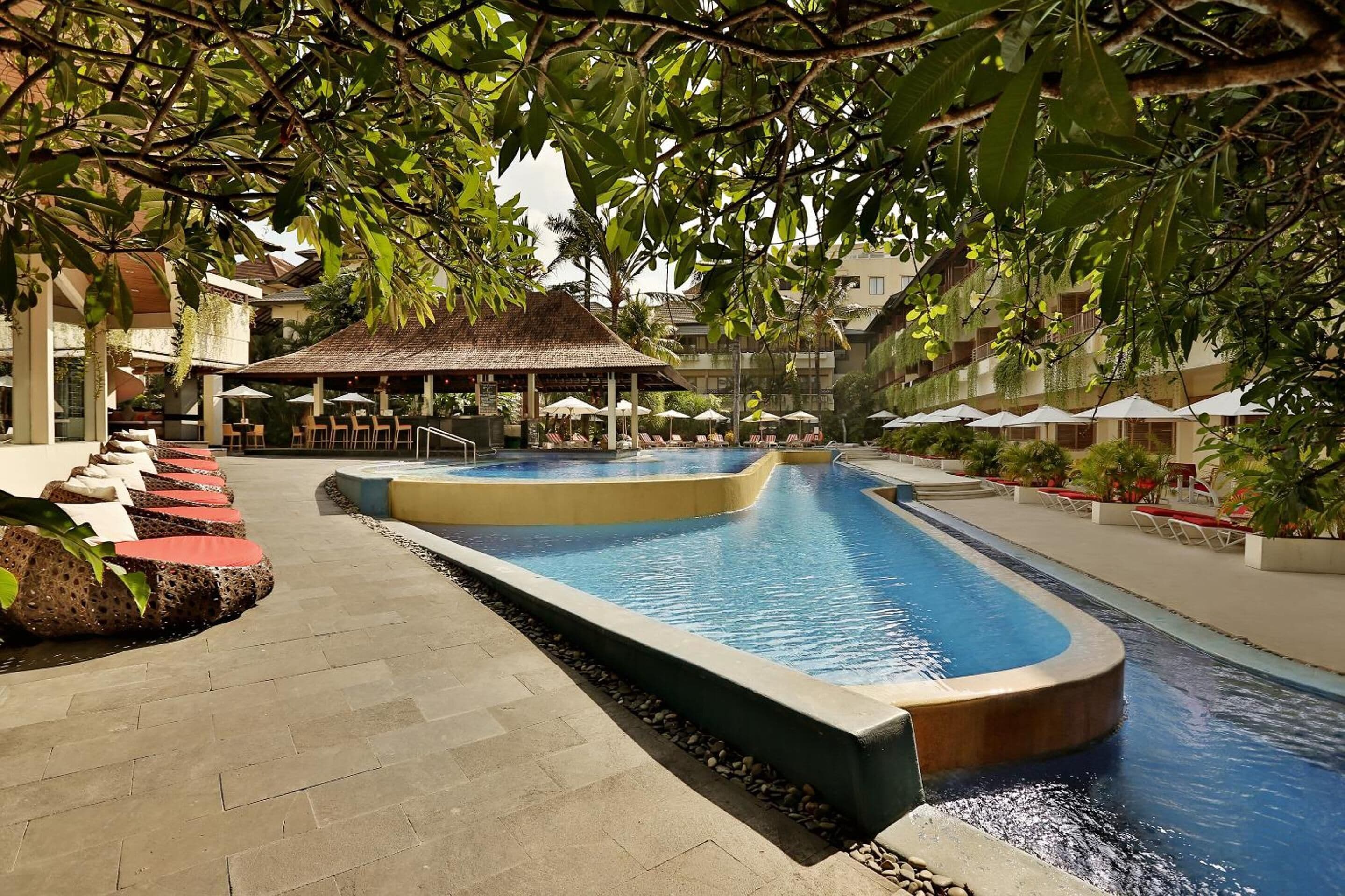 Outdoor pool, pool umbrellas, sun loungers