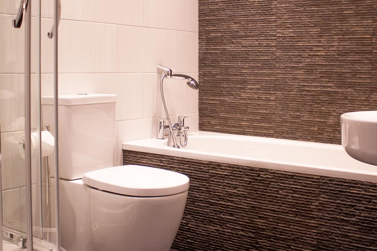 large double or twin bed | deep-soaking bathtub