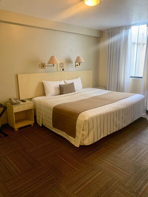 Standard Double Room, 1 King Bed | Premium bedding, minibar, in-room safe, desk