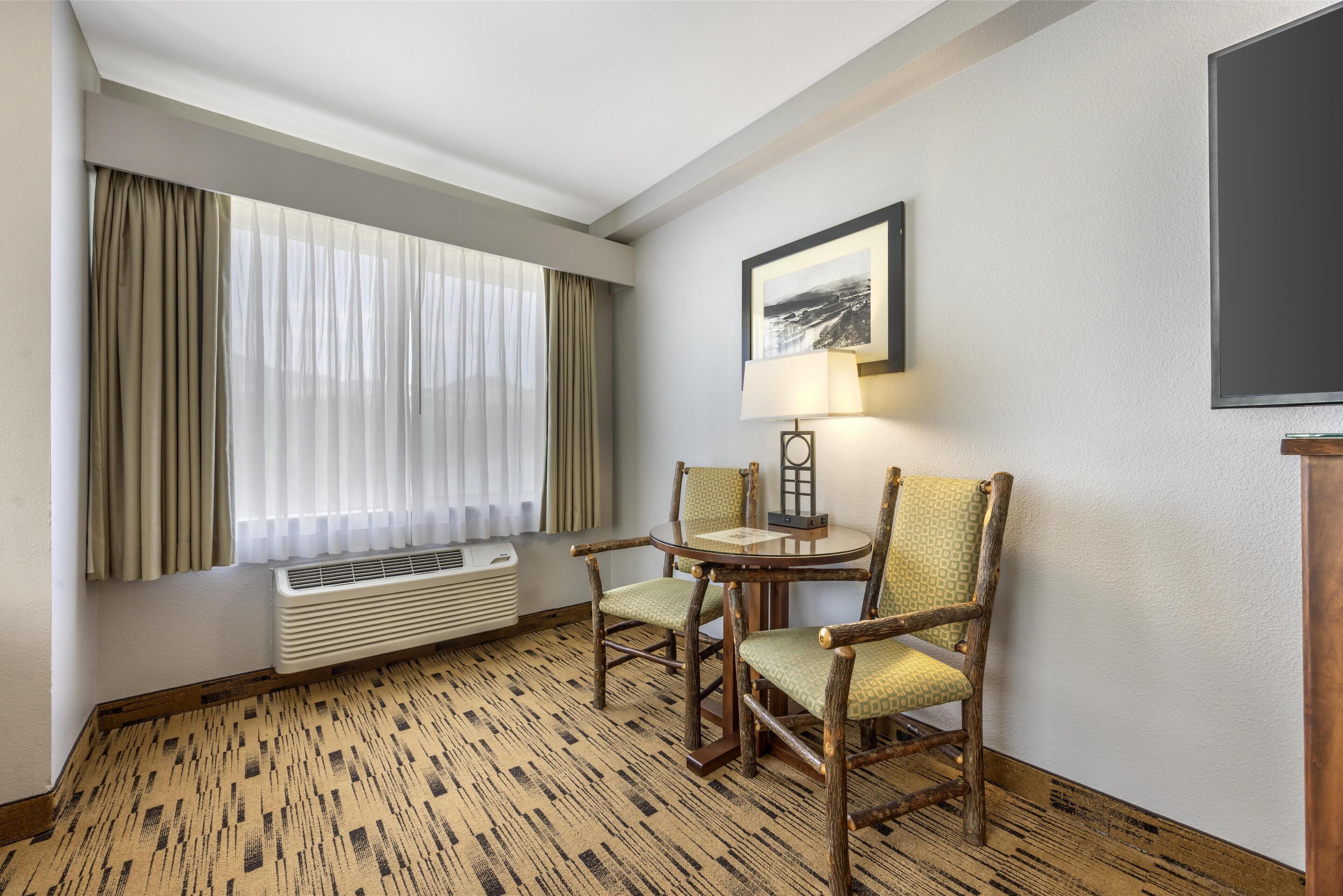 standard room, 2 queen beds, refrigerator & microwave, river view | 1 bedroom, in-room safe, desk, blackout curtains