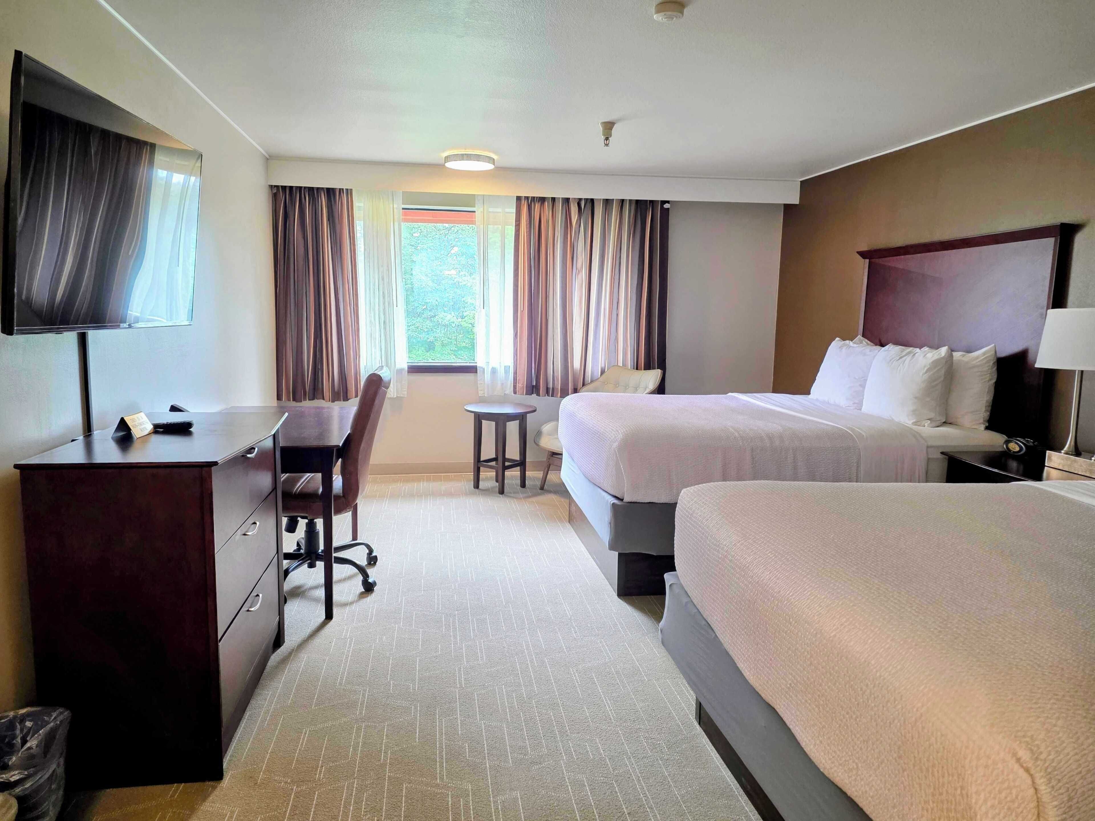 Premium bedding, pillow-top beds, in-room safe, desk