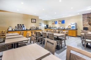Enjoy meals in our dining area, where guests can dine at multiple tables and a self-service counter.