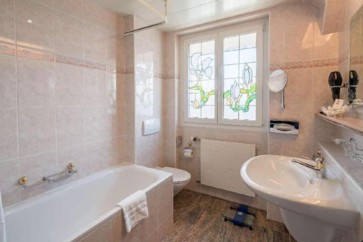 Bathroom | Shower, hair dryer, bathrobes, slippers