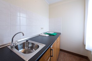Fridge, electric kettle, eco-friendly cleaning products