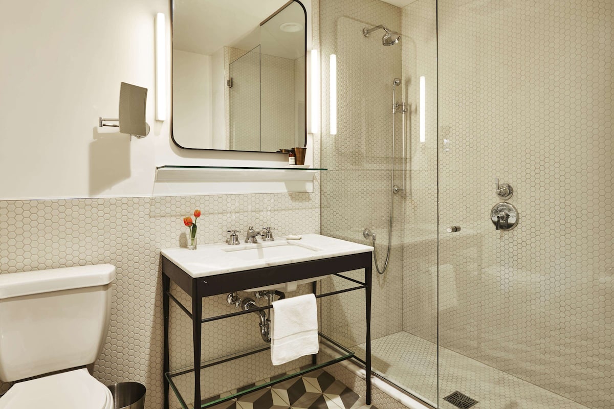 Designer toiletries, hair dryer, towels, soap