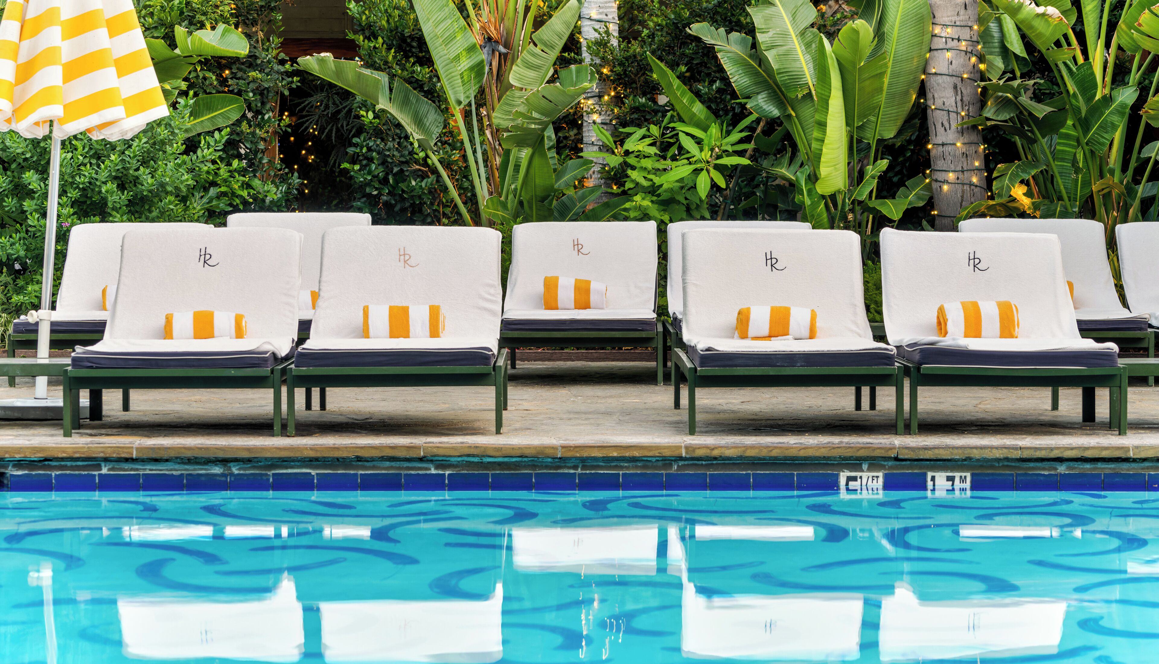 outdoor pool, pool umbrellas, pool loungers