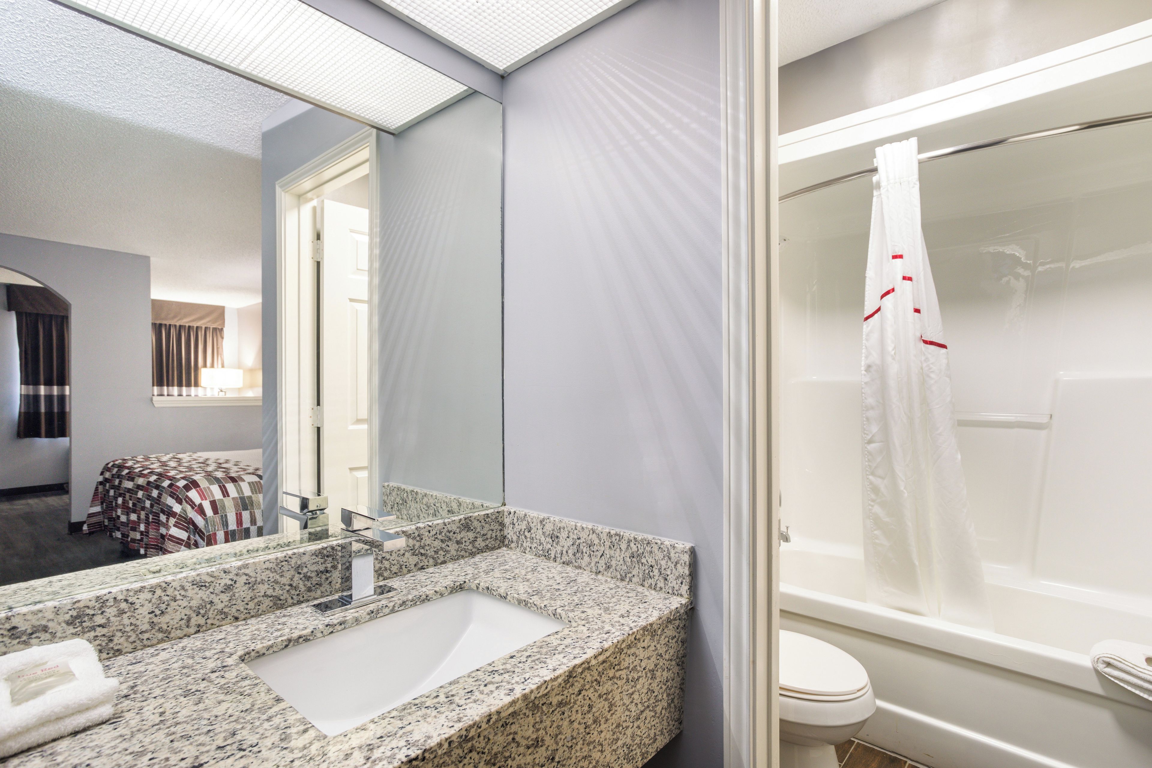 Blackout drapes, WiFi (free), alarm clocks, bed sheets