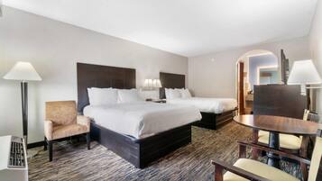 Premium bedding, pillow-top beds, desk, laptop workspace
