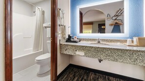 A bathroom with a shower, toilet, and sink. - Quality Inn Adairsville - Calhoun South (Adairsville)