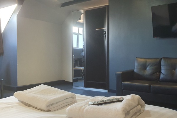 Junior Suite, 1 Bedroom, Ensuite | Desk, laptop workspace, iron/ironing board, free WiFi