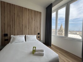 In-room safe, desk, laptop workspace, iron/ironing board