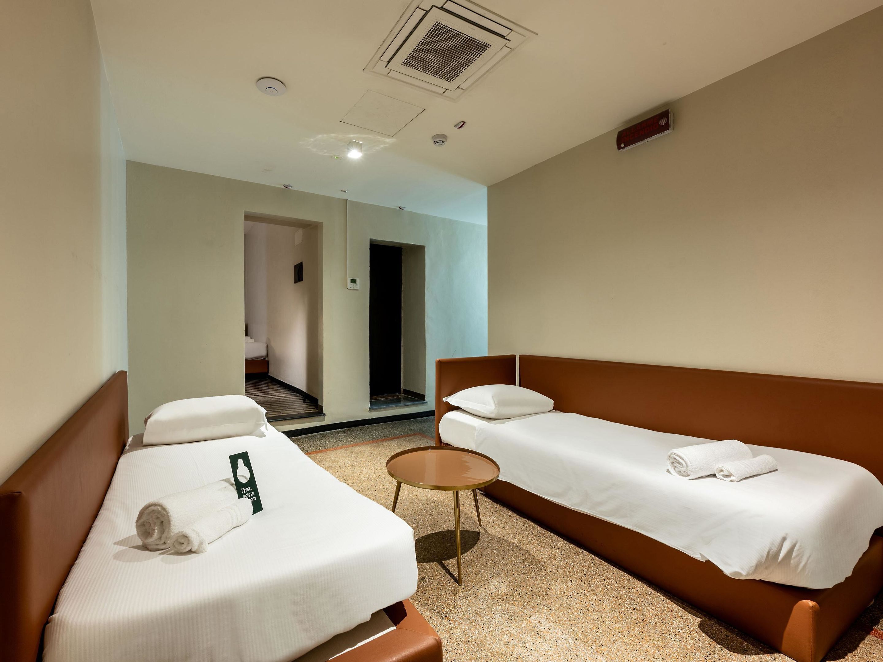 Standard Quadruple Room | In-room safe, desk, laptop workspace, iron/ironing board