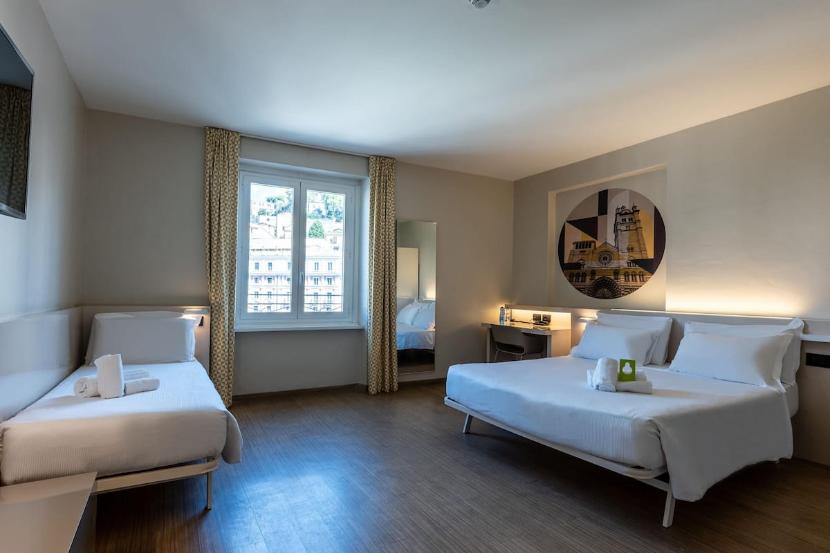 Superior Triple Room | In-room safe, desk, laptop workspace, iron/ironing board